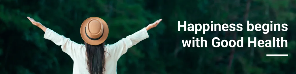 Woman in a hat with arms outstretched in a forest setting with "Happiness begins with Good Health" text overlay for Etta Vita Amazon storefront.