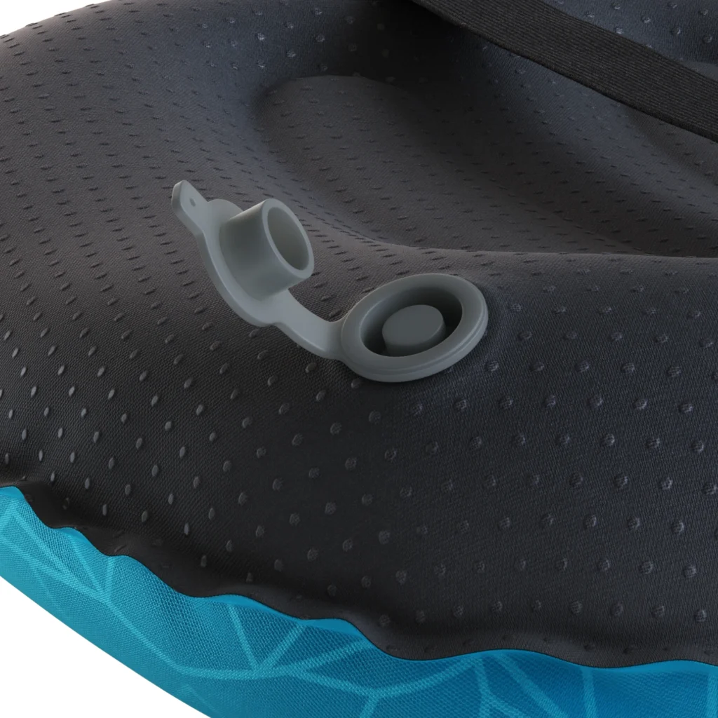 Close-up macro 3D rendering of the camping pillow inflation valve and anti-slip rubber dots fabric base